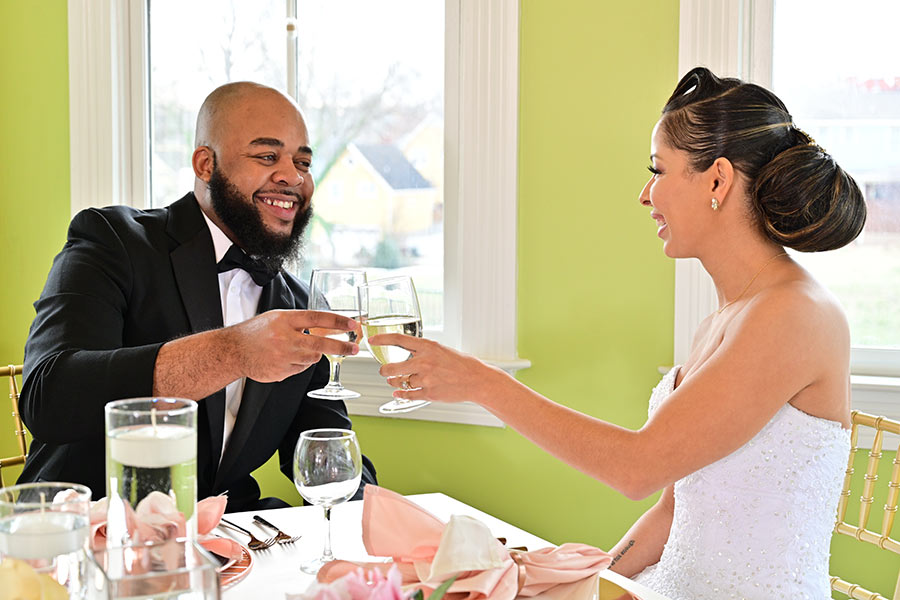 Bride and Groom toasting at our wedding venue in Greensboro, NC